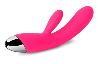 Upplev Svakom Angel, en rosa dubbelmotorig kaninvibrator med en elegant böjd design och metallbas. Den har två motorer för intensiva förnimmelser och två flexibla förlängningar för skräddarsydd njutning.